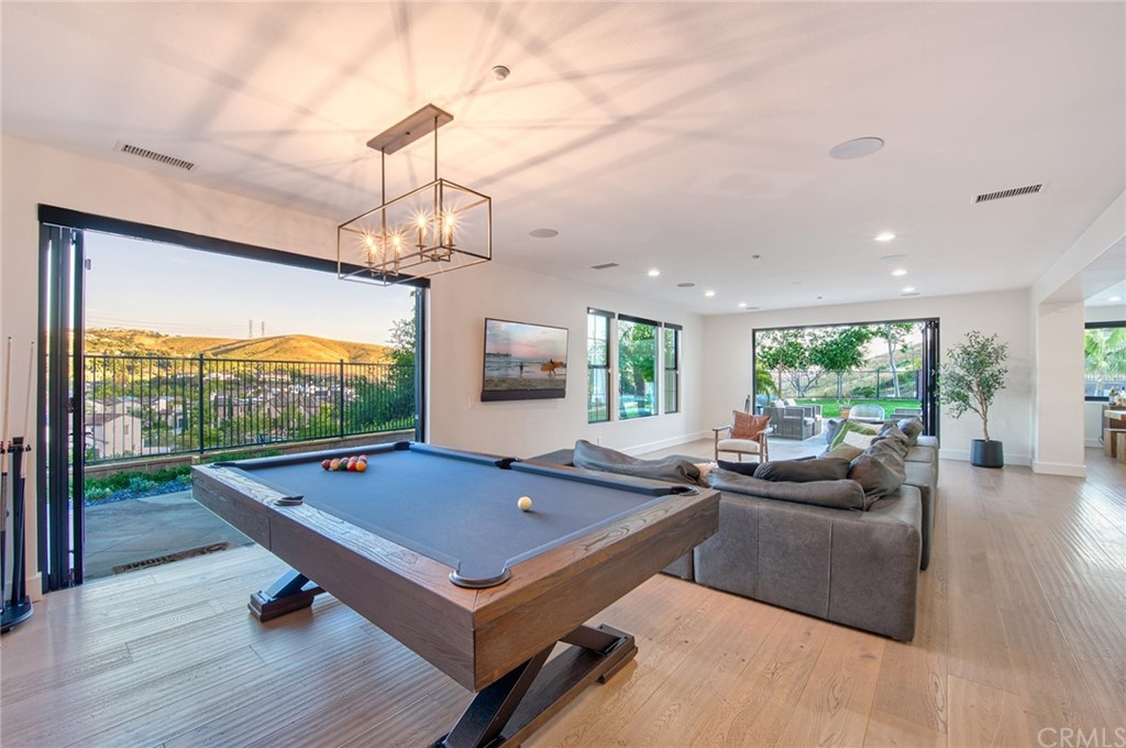 11 Epona Way Ladera Ranch, CA 92694 - Photo 5 of 41 a living room with patio furniture and a large window