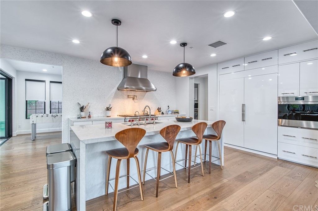 11 Epona Way Ladera Ranch, CA 92694 - Photo 8 of 41 a view of a dining room with furniture and wooden floor