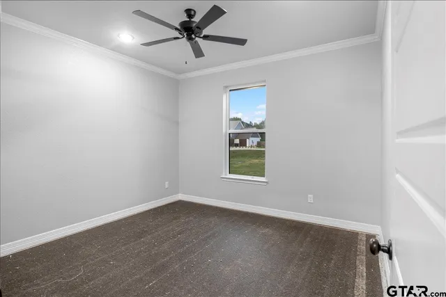 an empty room with closet area