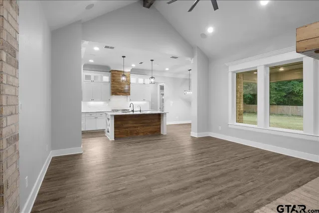a view of kitchen with wooden floor