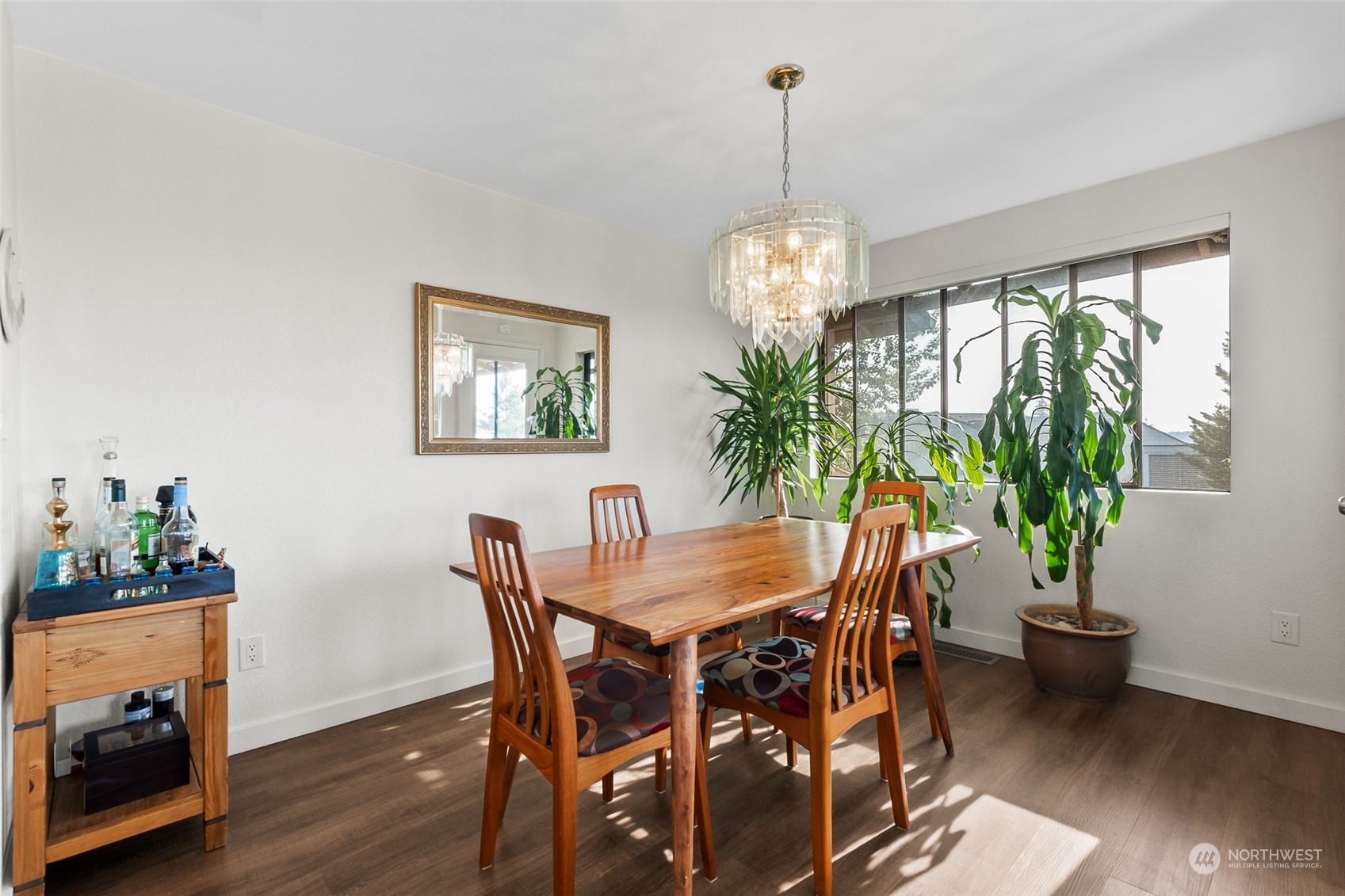 1501 Eagle Ridge Drive South, Unit G5 Renton, WA 98055 - Photo 11 of 23 a view of a dining room with furniture window and wooden floor
