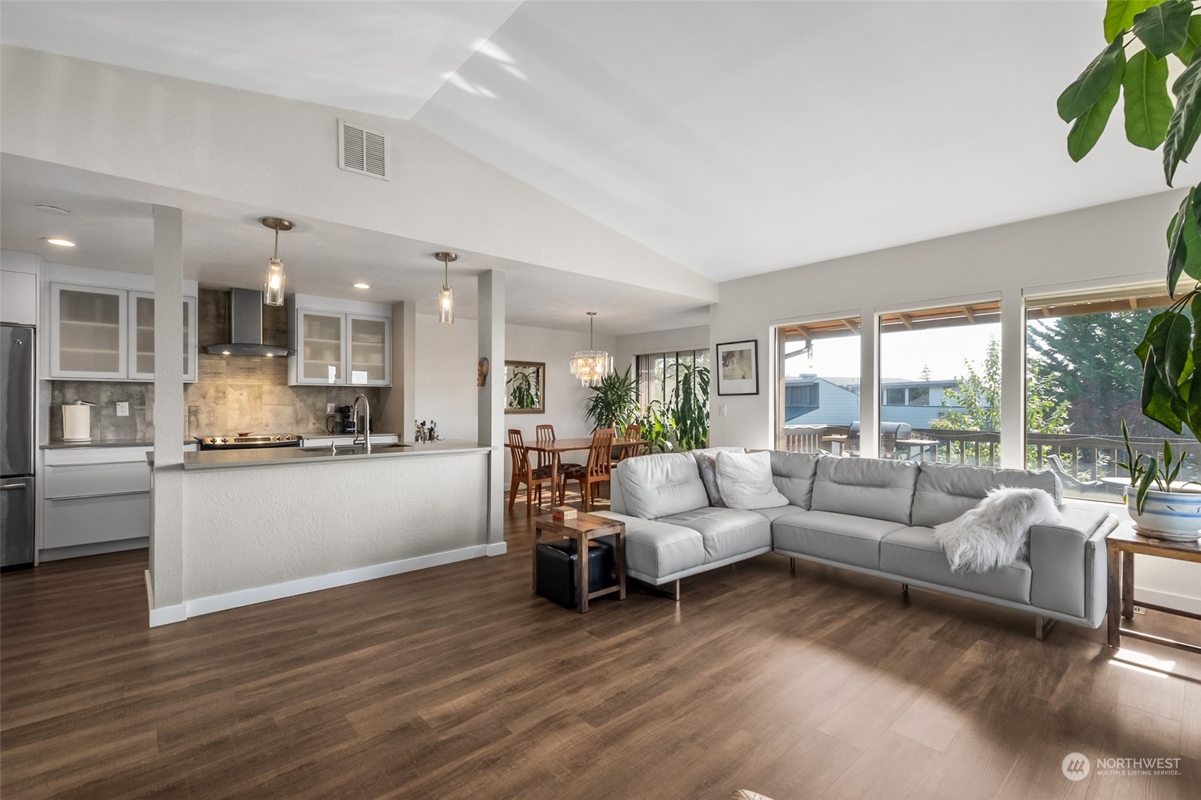 1501 Eagle Ridge Drive South, Unit G5 Renton, WA 98055 - Photo 10 of 23 a living room with furniture and a large window