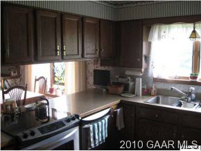3272 Hermitage Road Waynesboro, VA 22980 - Photo 4 of 12 a kitchen with a sink a stove and a window