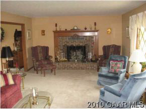 3272 Hermitage Road Waynesboro, VA 22980 - Photo 5 of 12 a living room with furniture and a fireplace