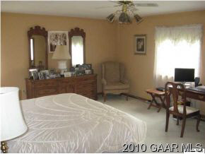 3272 Hermitage Road Waynesboro, VA 22980 - Photo 7 of 12 a bed room with a bed and a television