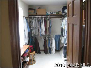 3272 Hermitage Road Waynesboro, VA 22980 - Photo 8 of 12 a view of walk in closet with clothes and shoes