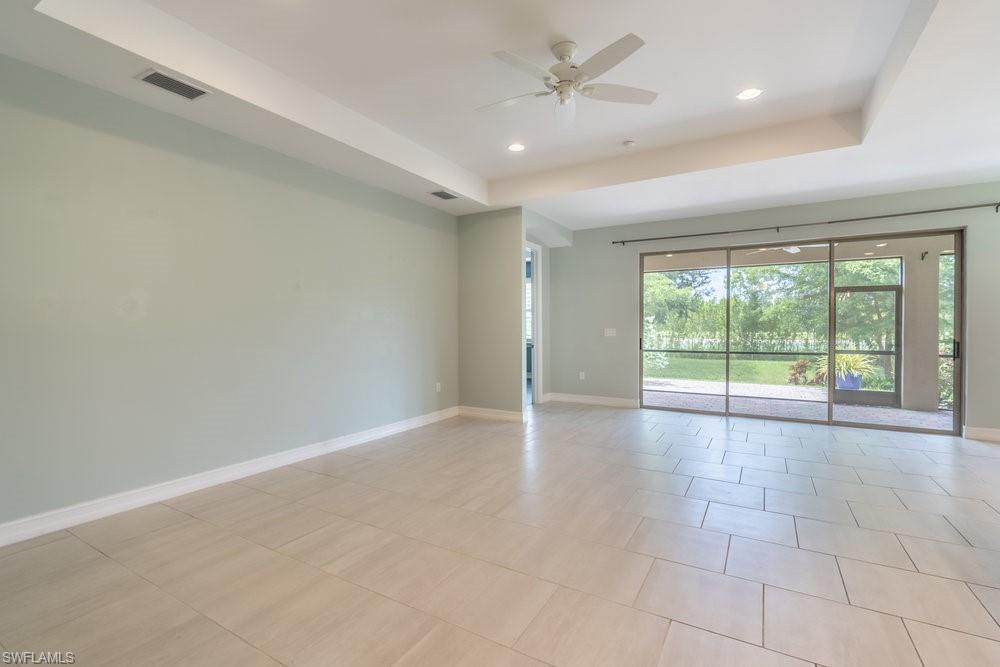 16374 Barclay Court Naples, FL 34110 - Photo 7 of 32 a view of an empty room with a window