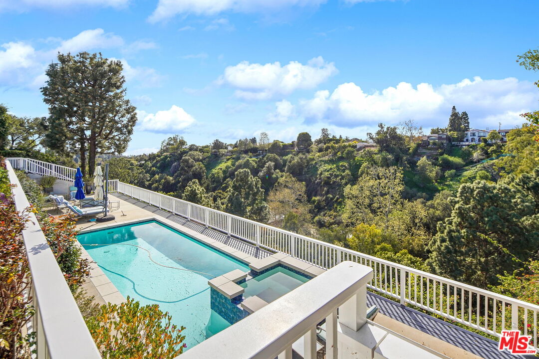 a view of a balcony with mountain view