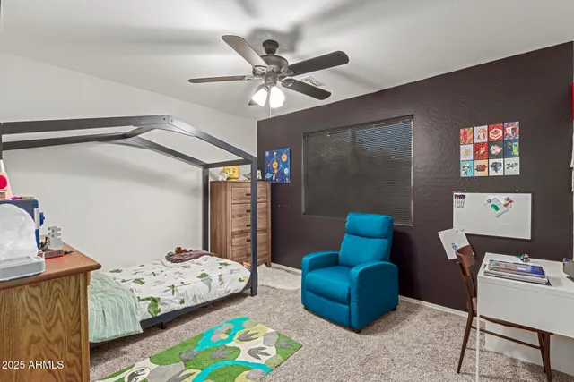 a bedroom with furniture and a bed