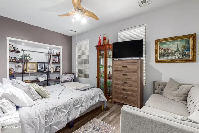 a bedroom with a bed and furniture