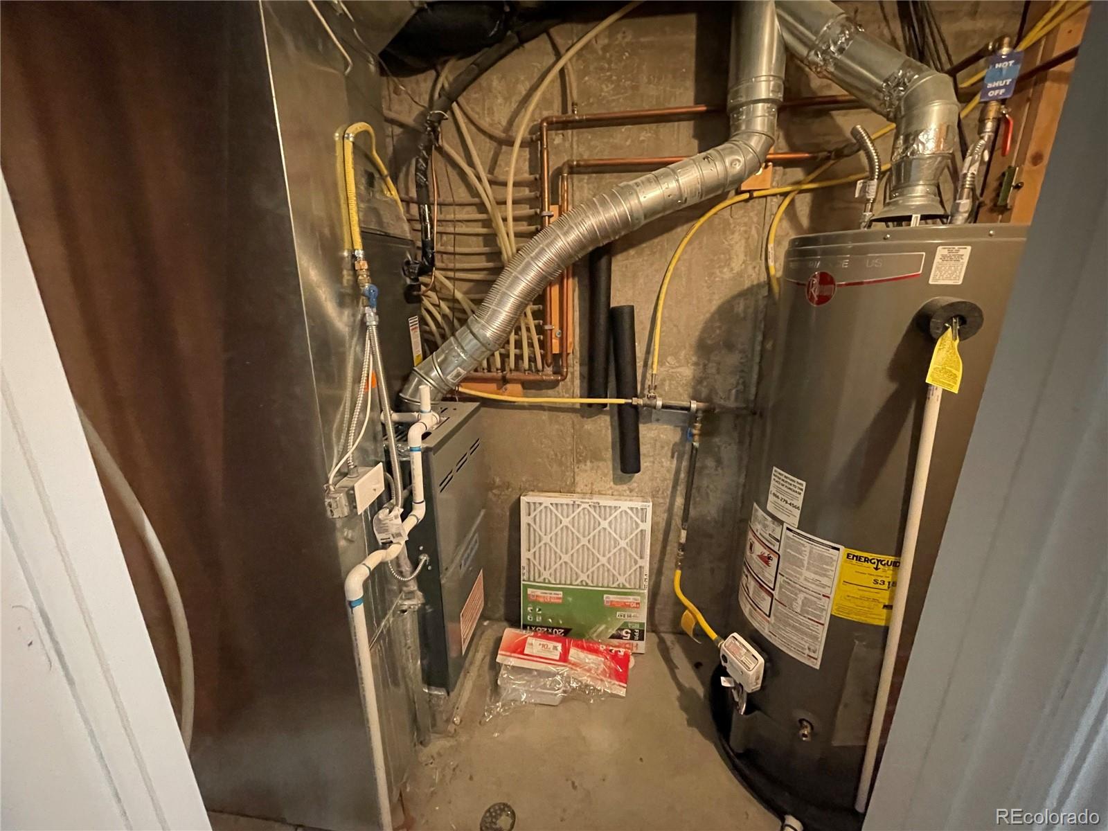 5925-5943 University Village View Colorado Springs, CO 80918 - Photo 21 of 21 a utility room with a washer and dryer