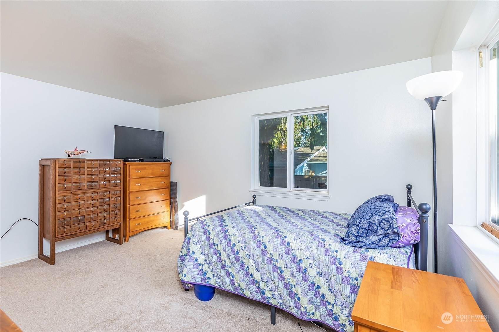 24 157th Place Southeast Bothell, WA 98012 - Photo 14 of 27 a bedroom with a bed and a window