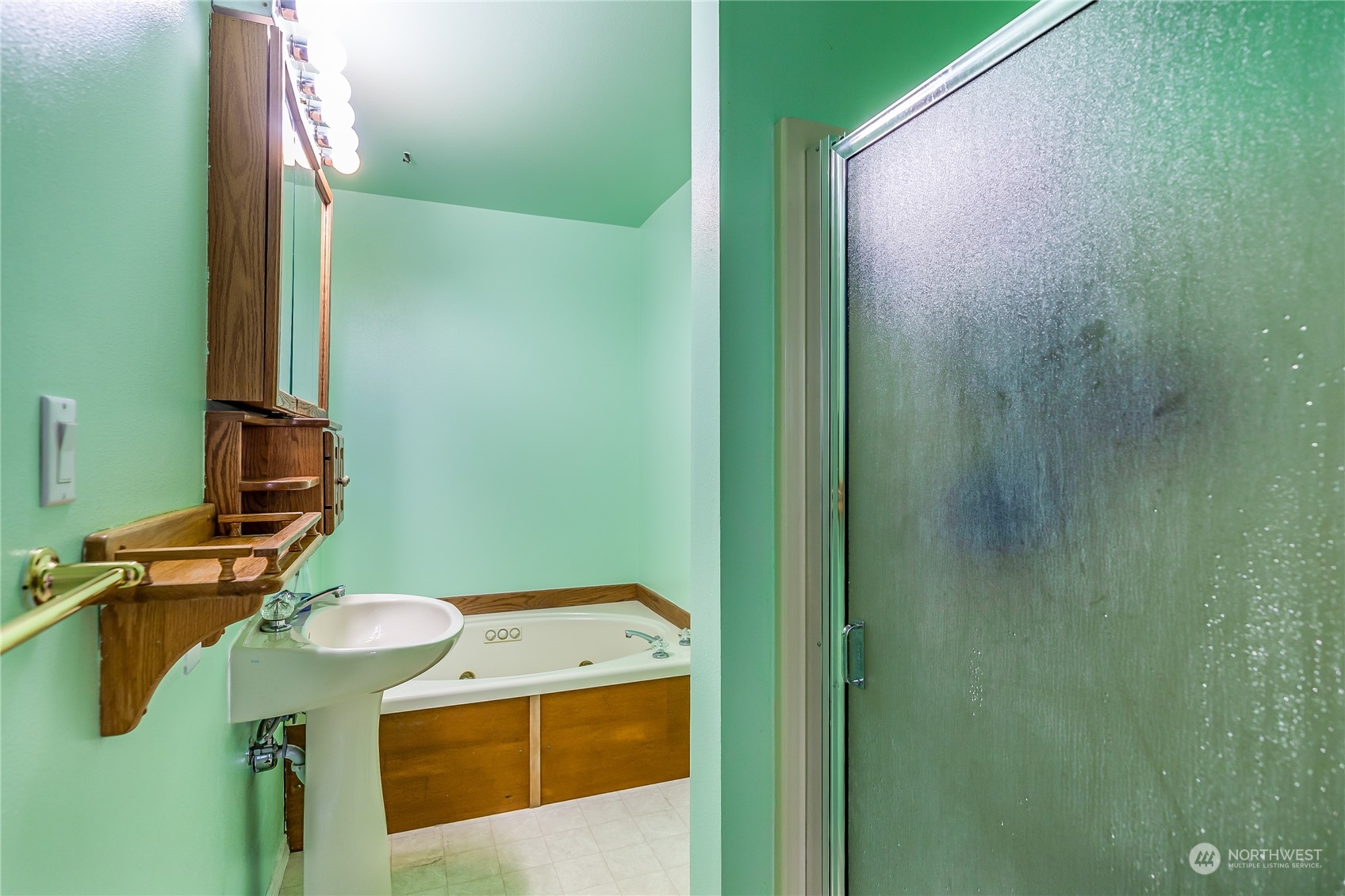 24 157th Place Southeast Bothell, WA 98012 - Photo 17 of 27 a bathroom with a sink and a mirror