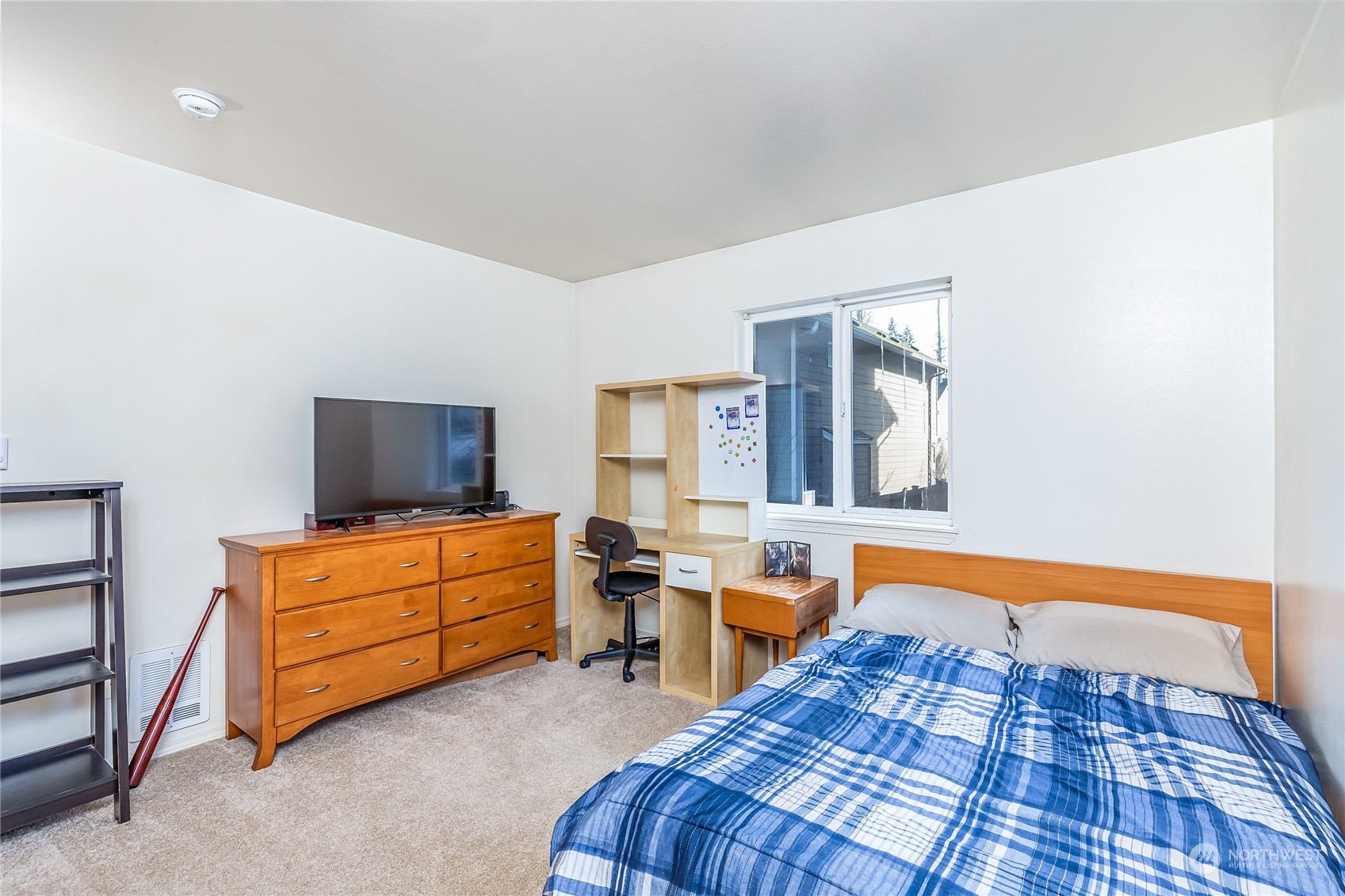24 157th Place Southeast Bothell, WA 98012 - Photo 19 of 27 a room with furniture and flat screen tv