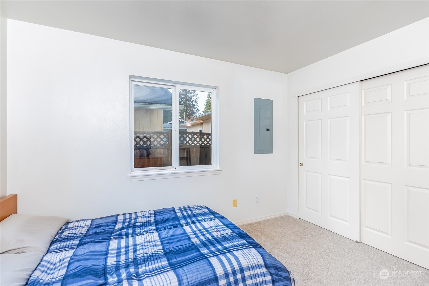24 157th Place Southeast Bothell, WA 98012 - Photo 20 of 27 a bedroom with a bed and a window