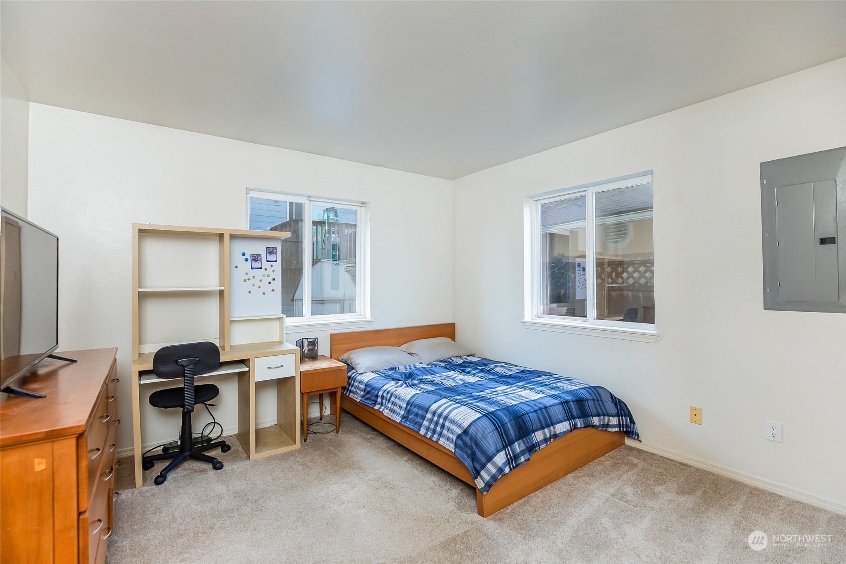 24 157th Place Southeast Bothell, WA 98012 - Photo 21 of 27 a bedroom with a bed and a window