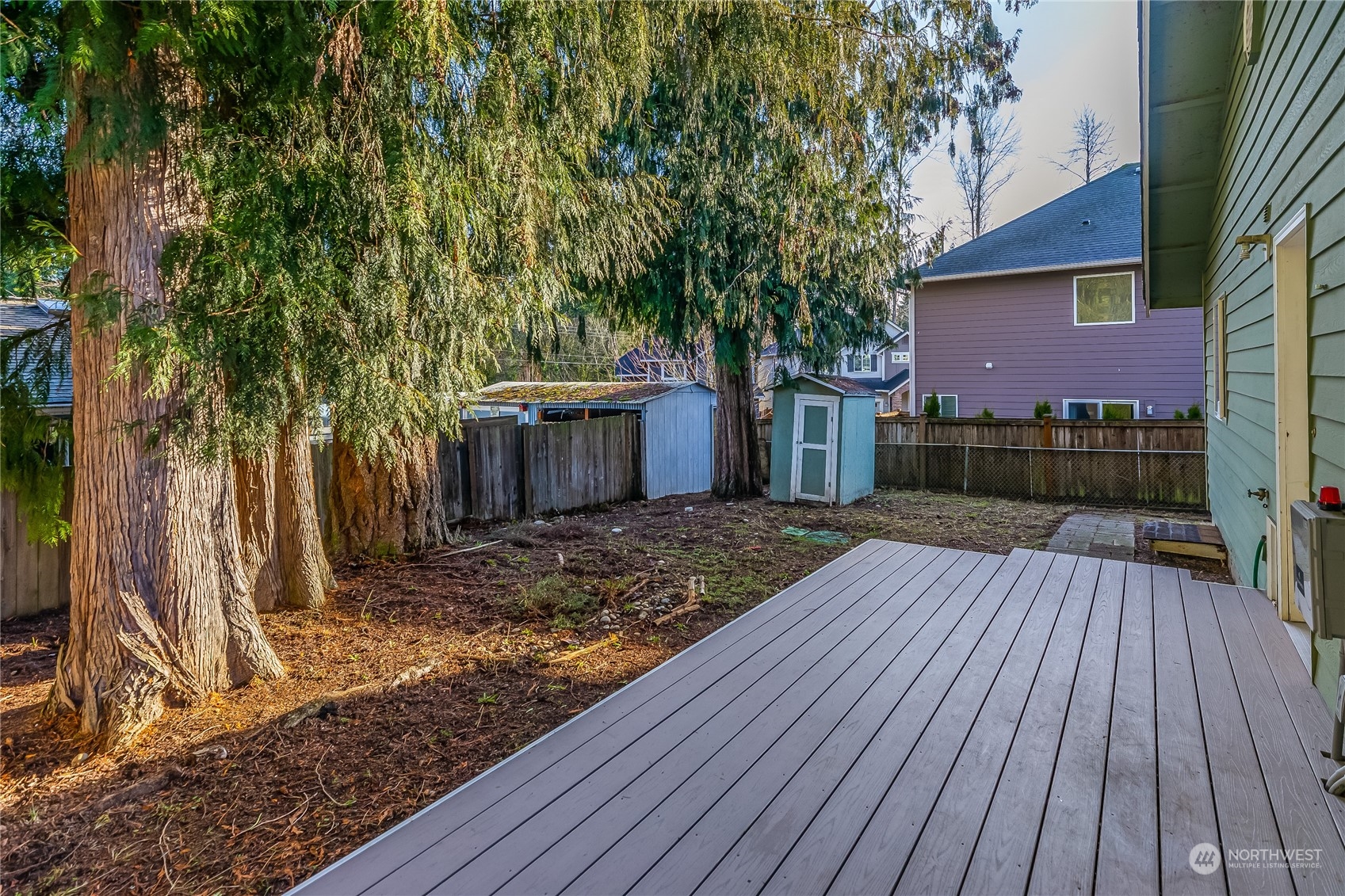 24 157th Place Southeast Bothell, WA 98012 - Photo 25 of 27 a view of backyard with wooden floor