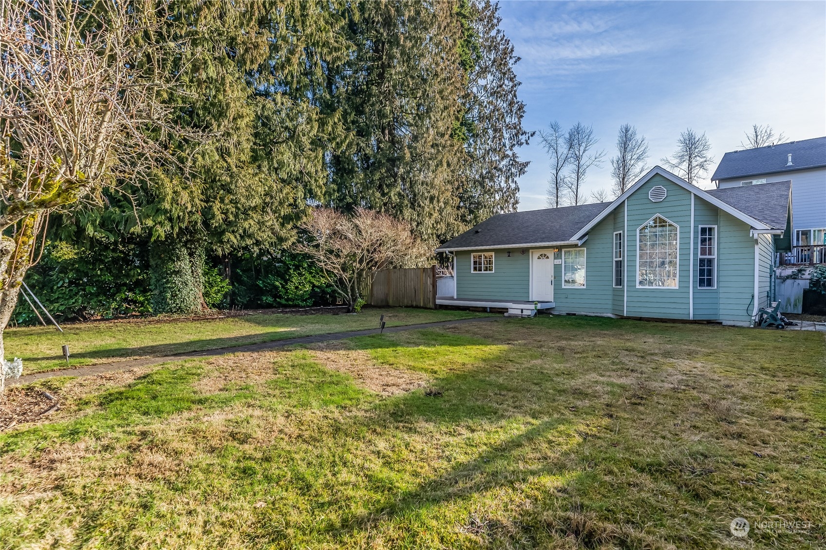 24 157th Place Southeast Bothell, WA 98012 - Photo 3 of 27 a view of a house with a backyard