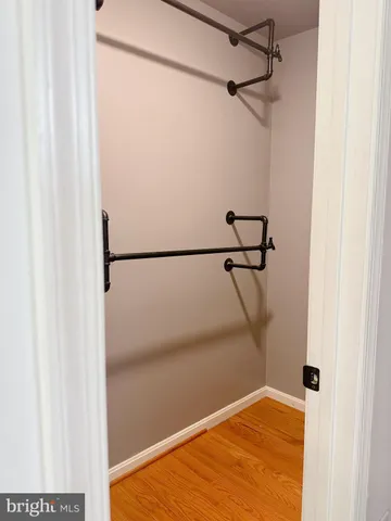 a view of a room with racks on the wall