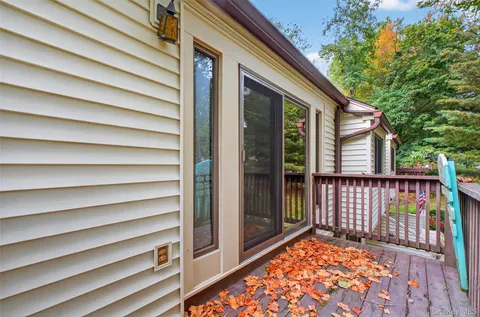 a view of a balcony with a swing