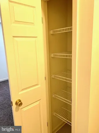 a view of a room that has a window in it