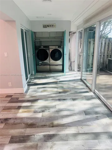 a bedroom with a bed and a fireplace