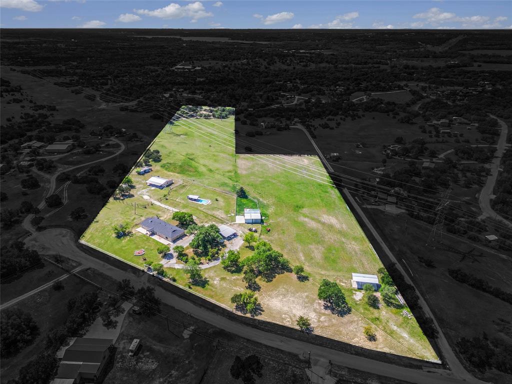 748 Rocky Ridge Lane Weatherford, TX 76085 - Photo 2 of 38 a view of a yard