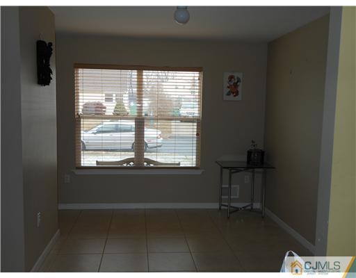 18 Caldwell Road Edison, NJ 08817 - Photo 6 of 11 a view of an empty room with a window
