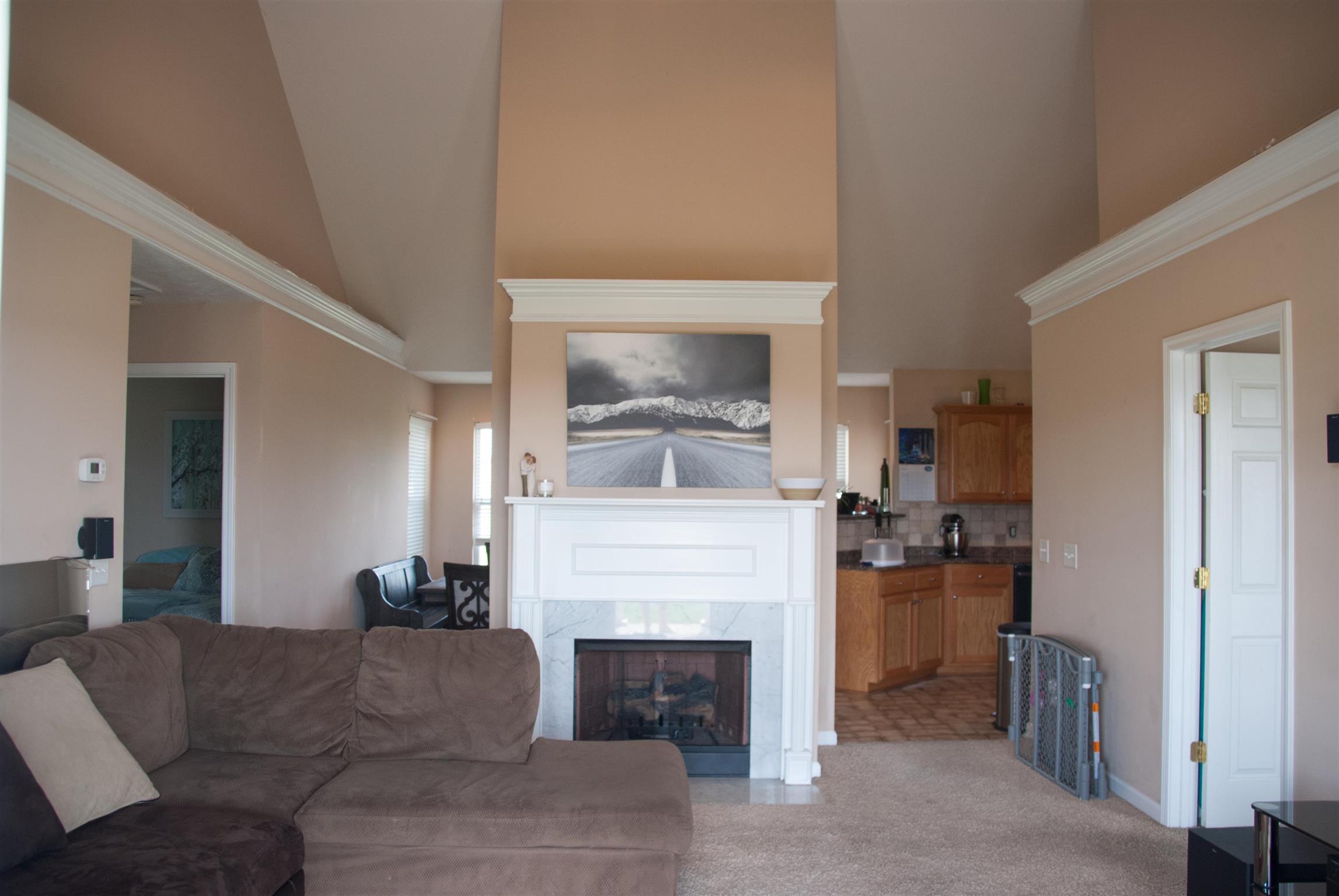 718 Lear Road Portland, TN 37148 - Photo 3 of 17 a living room with furniture and a fireplace