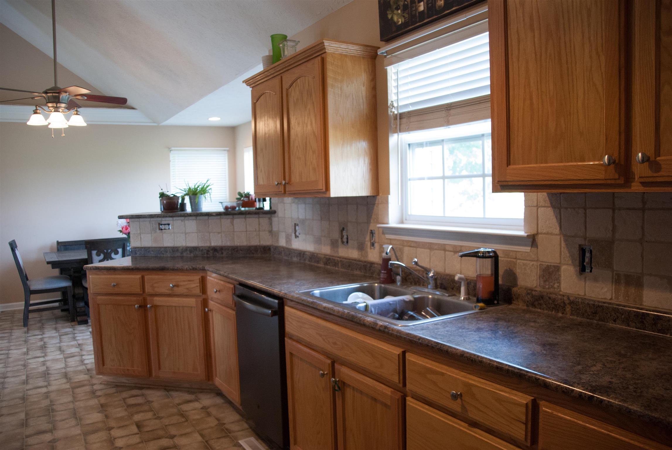 718 Lear Road Portland, TN 37148 - Photo 8 of 17 a kitchen with a sink cabinets and window