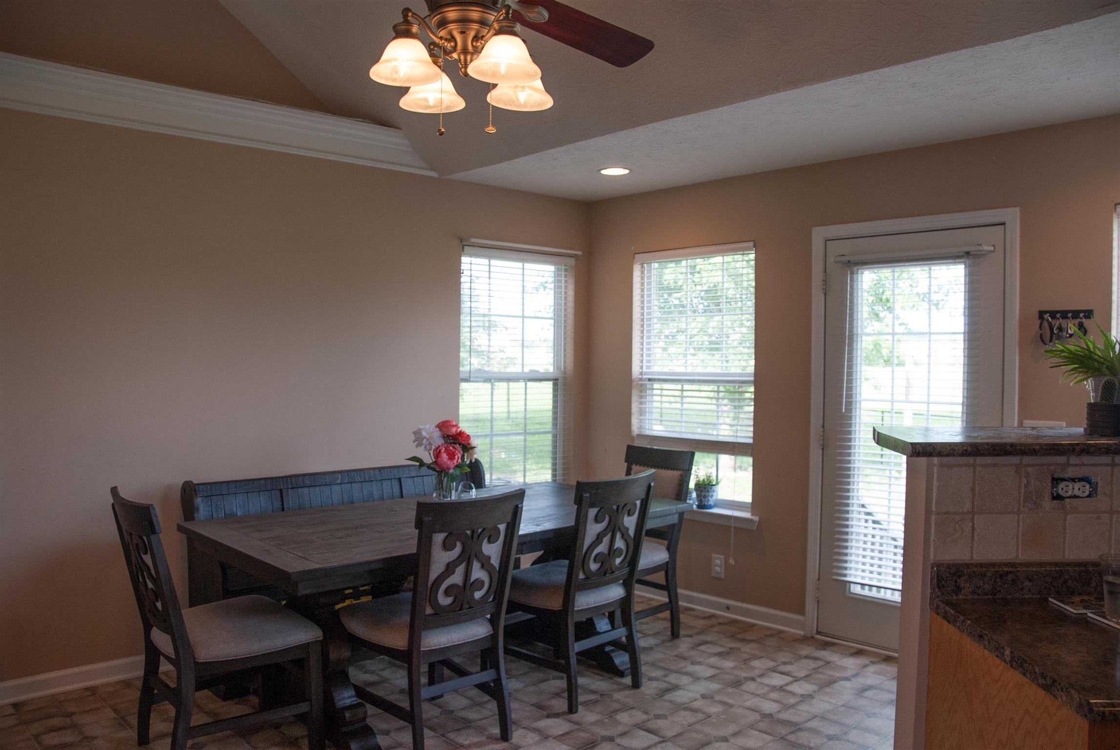 718 Lear Road Portland, TN 37148 - Photo 10 of 17 a view of a dining room with furniture window and outside view