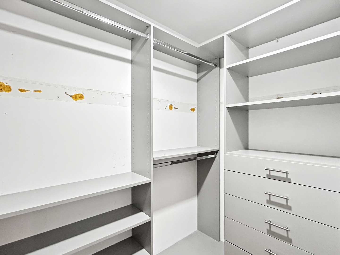 655 West Irving Park Road, Unit 3608 Chicago, IL 60613 - Photo 15 of 20 a view of walk in closet with empty racks