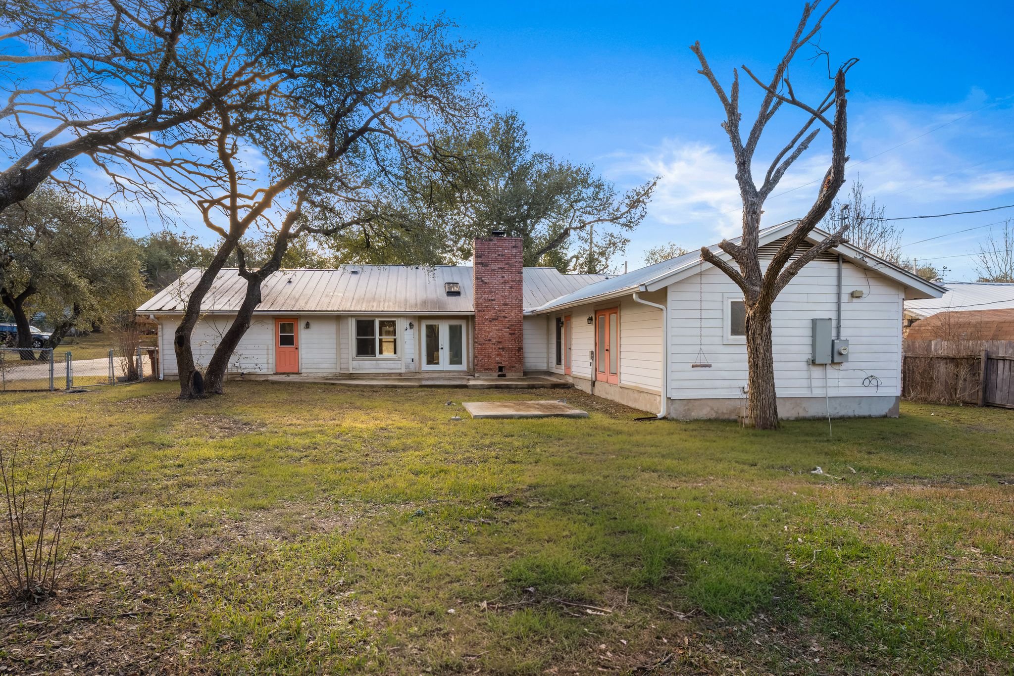 13203 Stillforest Street Austin, TX 78729 - Photo 28 of 33 a front view of a house with garden