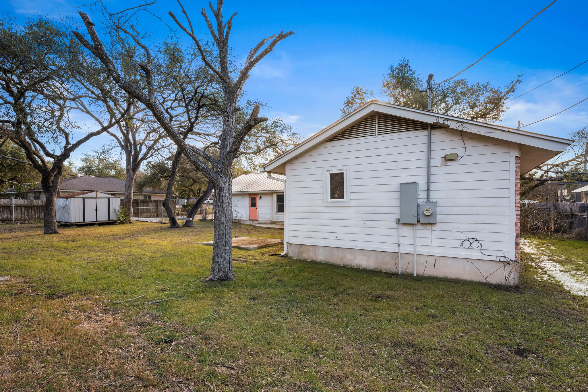 13203 Stillforest Street Austin, TX 78729 - Photo 29 of 33 a view of a house with a yard