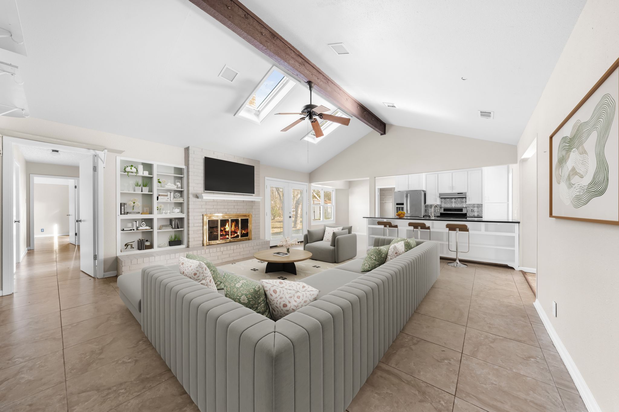 13203 Stillforest Street Austin, TX 78729 - Photo 5 of 33 a living room with furniture kitchen view and a fireplace