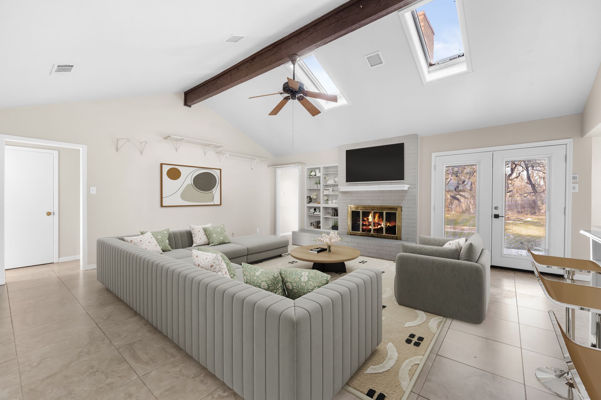 13203 Stillforest Street Austin, TX 78729 - Photo 7 of 33 a living room with furniture and a flat screen tv