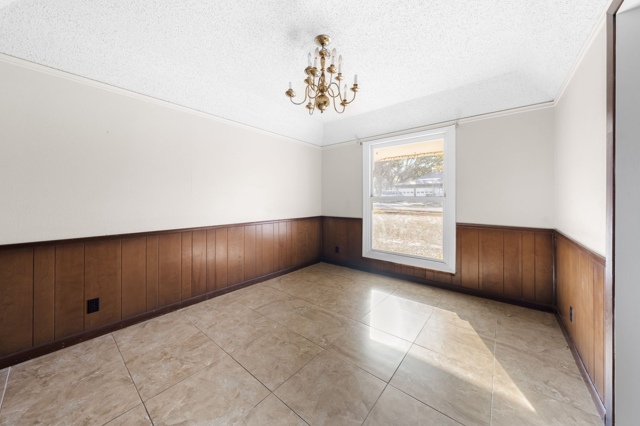 13203 Stillforest Street Austin, TX 78729 - Photo 8 of 33 a view of an empty room with a window