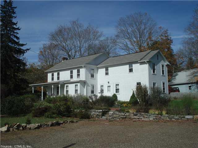 112 Depot Road Storrs Mansfield, CT 06268 - Photo 1 of 1 a view of a white house next to a road and yard