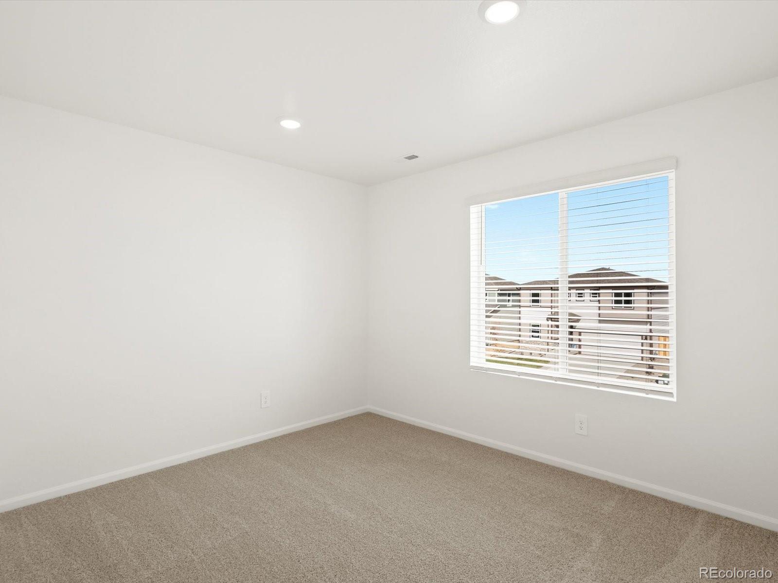 7343 West 27th Street Greeley, CO 80634 - Photo 17 of 29 an empty room with a window