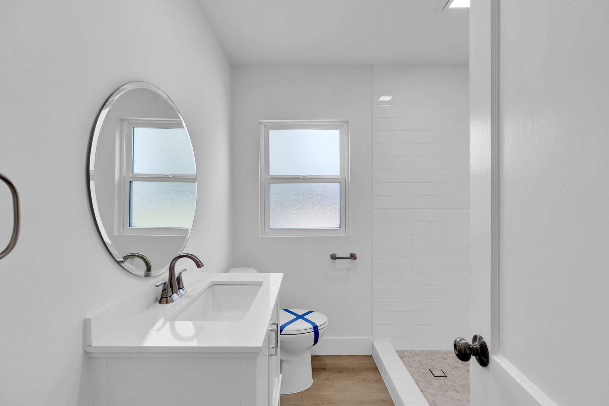 3511 Arbor Street Houston, TX 77004 - Photo 15 of 17 a bathroom with a sink and a mirror