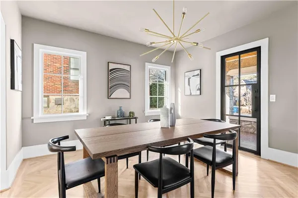 a view of kitchen with cabinets and wooden floor