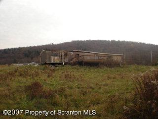 586 A Warren Ctr Road Warren Center, PA 18851 - Photo 2 of 5 Back view, looking toward Warren Ctr Rd