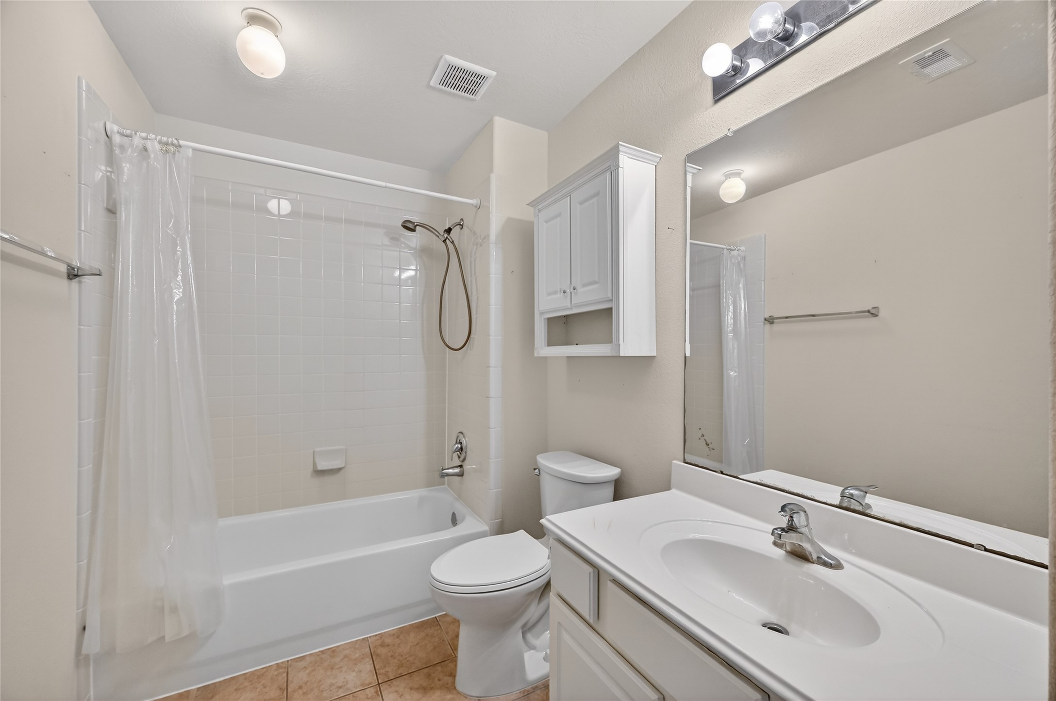 14903 Hurst Point Lane Houston, TX 77049 - Photo 14 of 17 a bathroom with a sink toilet tub and shower