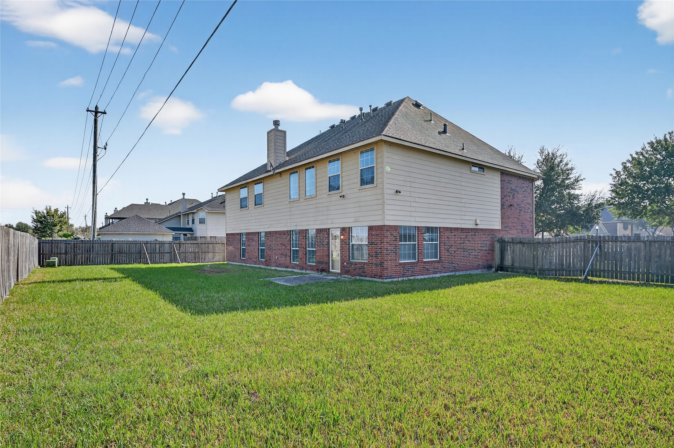 14903 Hurst Point Lane Houston, TX 77049 - Photo 17 of 17 a view of a house with a yard