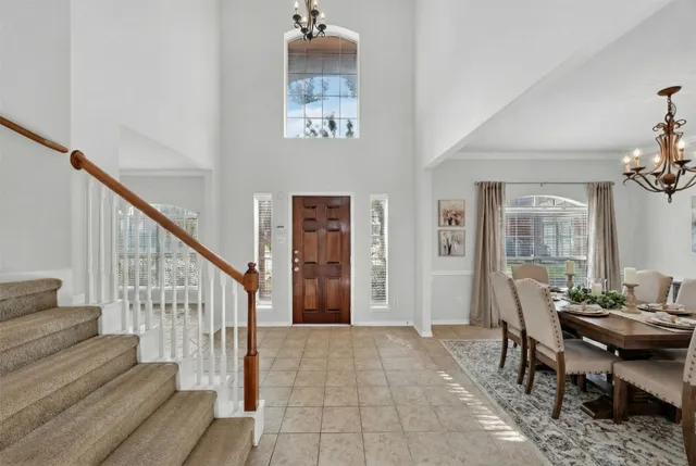 a view of a hallway with seating area