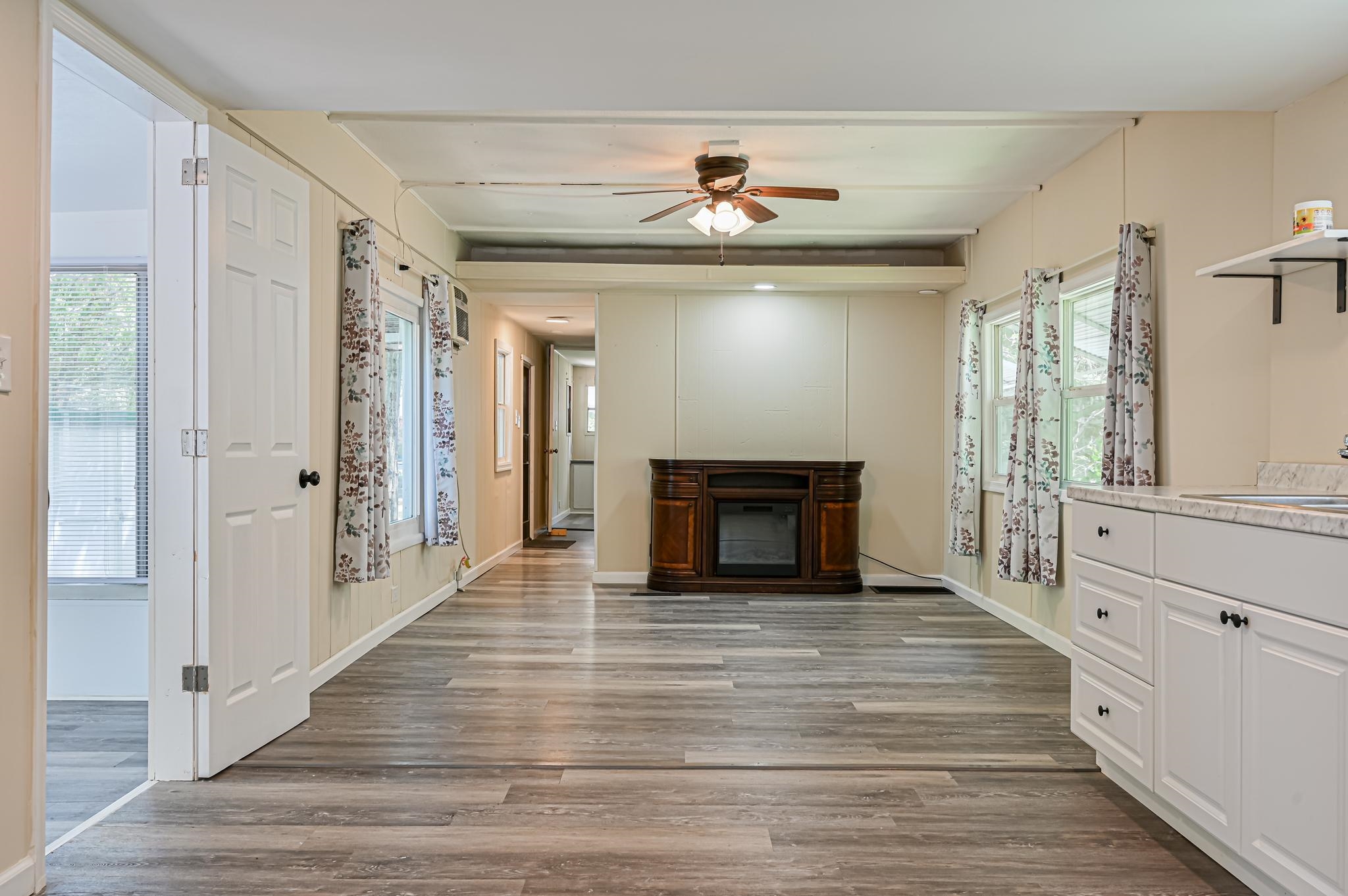 63 Ferren Rio Grande, NJ 08242 - Photo 11 of 22 a view of an empty room with wooden floor and a window