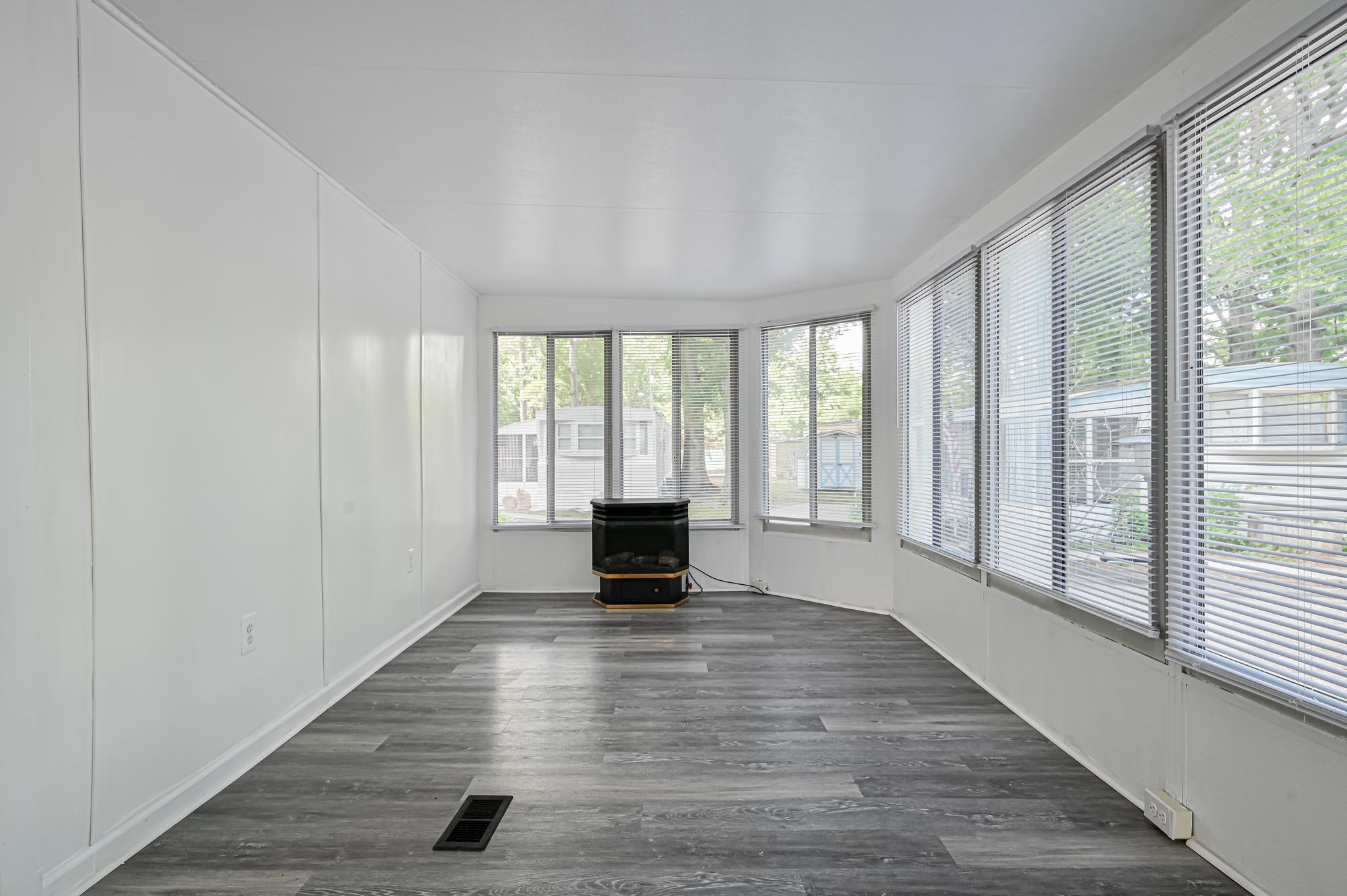 63 Ferren Rio Grande, NJ 08242 - Photo 17 of 22 a view of an empty room with wooden floor and a window