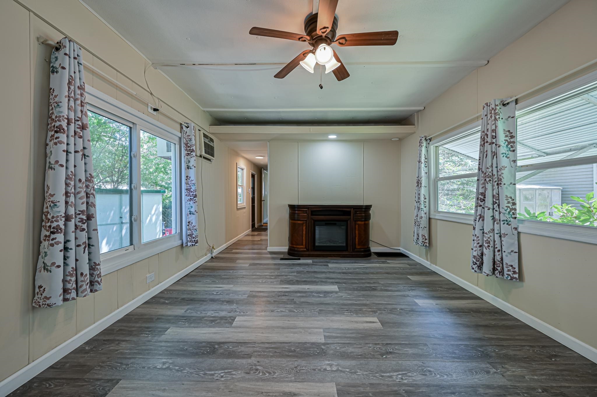 63 Ferren Rio Grande, NJ 08242 - Photo 10 of 22 a view of an empty room with a window and wooden floor