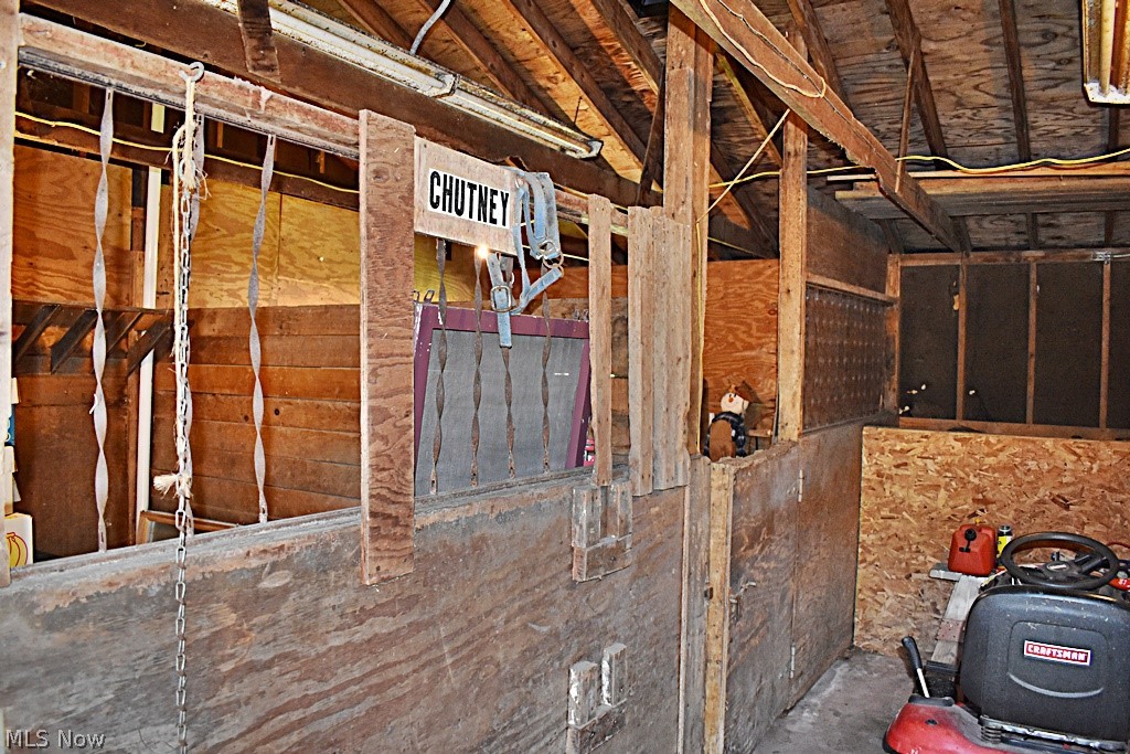 6670 Dunham Road Walton Hills, OH 44146 - Photo 33 of 35 Stalls with storage area, hay area and attached 1 car garage with carport...