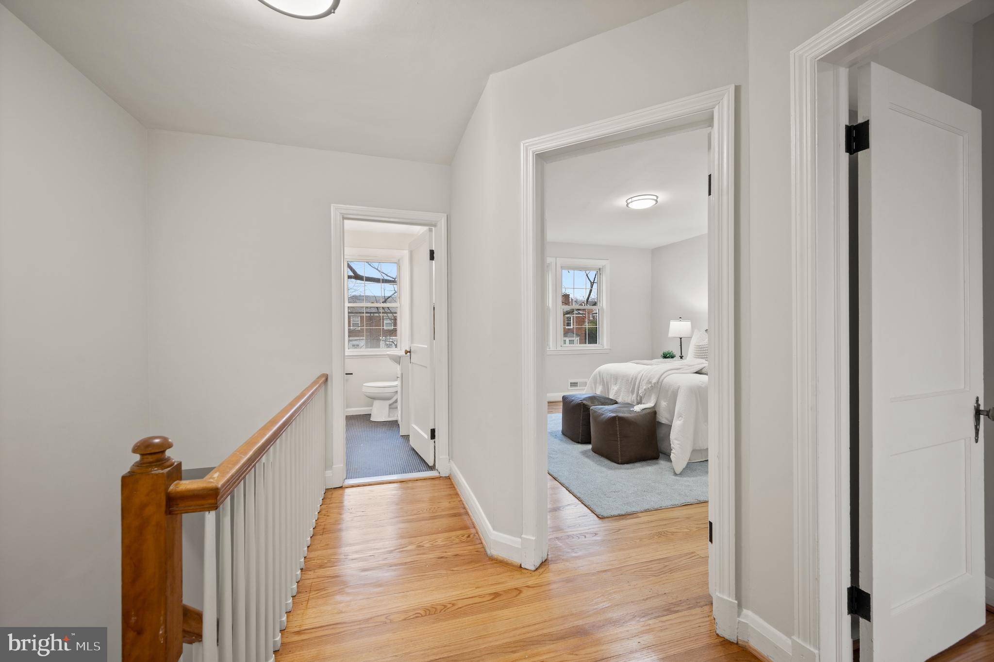 323 Stratford Road Baltimore, MD 21228 - Photo 16 of 35 a view of a living room and hardwood floor